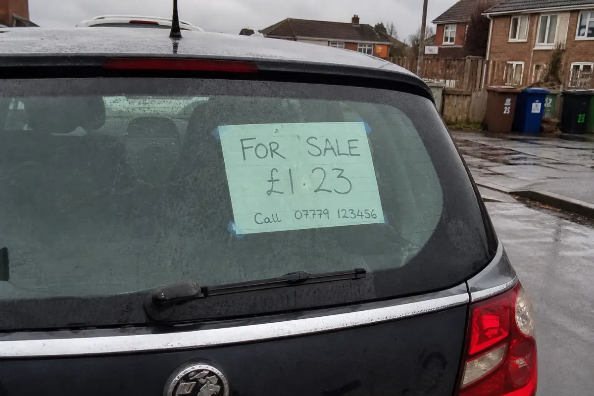 The "for sale" sign